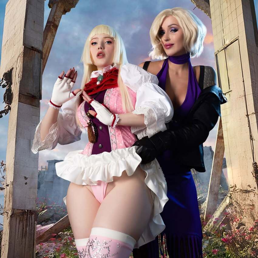2girls blonde_hair breasts clothes_lift cosplay emilie_de_rochefort fingerless_gloves gloves ladalyumos large_breasts lifting_another&#039;s_clothes long_hair looking_at_viewer multiple_girls nina_williams panties photo_(medium) real_life short_hair skirt skirt_lift tekken tekken_8 thick_thighs thighs underwear valery_himera