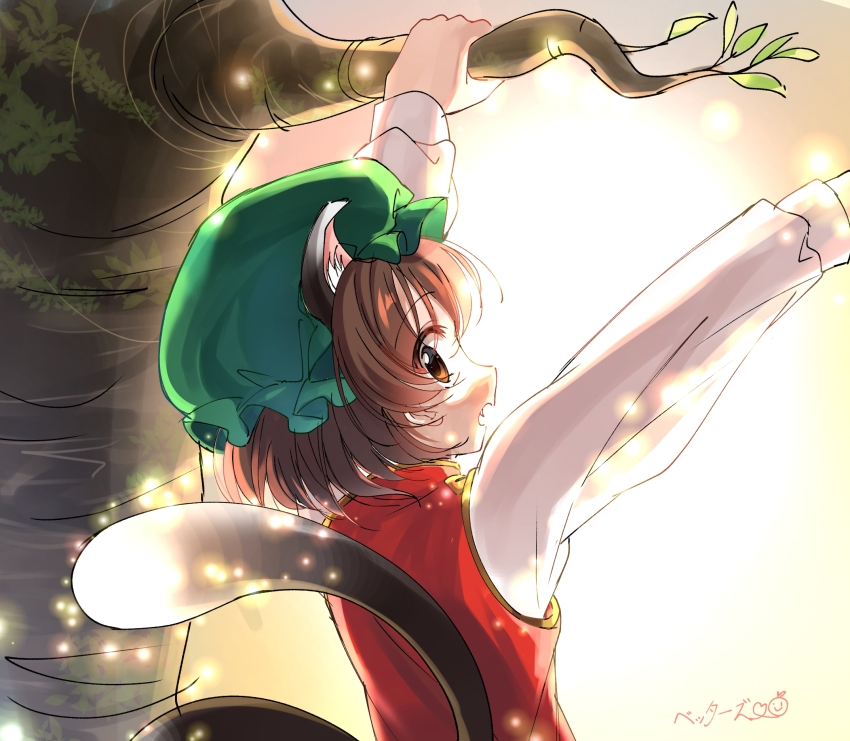 1girl animal_ears arms_up backlighting bloom brown_eyes brown_hair cat_ears cat_tail chen commentary_request fang gold_trim green_hat hanging_from_tree hat highres light_particles long_sleeves looking_at_viewer looking_back mikan_(user_zsyg8485) mob_cap multiple_tails nekomata open_mouth overexposure profile red_vest sideways_glance solo tail touhou two_tails vest