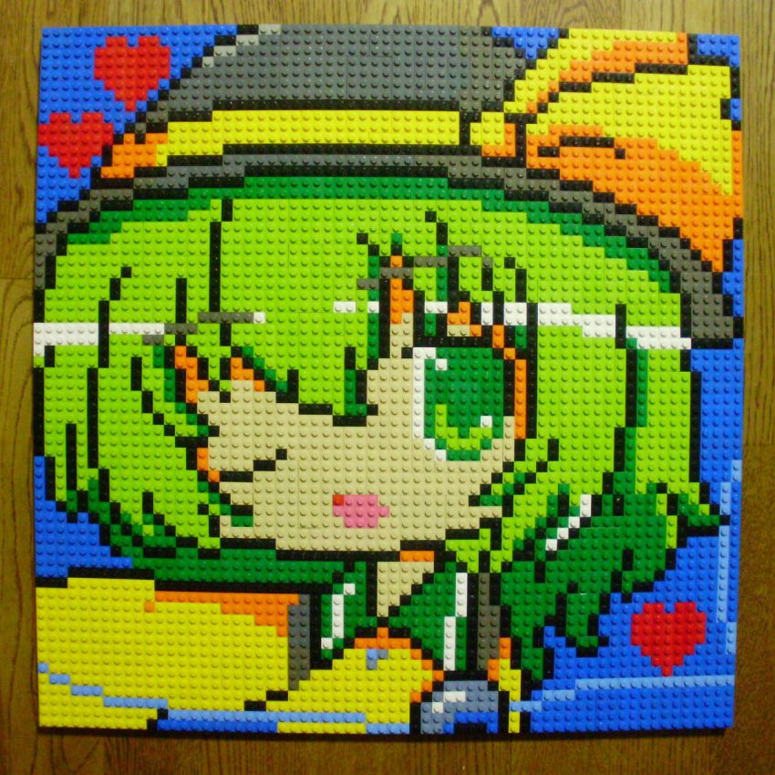 1girl eyeball female_focus green_eyes green_hair hat heart highres komeiji_koishi lego lego_(medium) matching_hair/eyes one_eye_closed open_mouth photo_(medium) pixel_art short_hair solo sun_hat third_eye touhou unconventional_media wink you_rei_(blowback)
