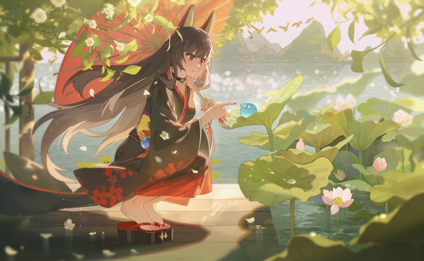 1girl absurdres akagi_(warship_girls_r) alternate_costume animal_ear_fluff animal_ears black_hair black_kimono blunt_bangs blush brown_hair chichengde_haotidu_afusang closed_mouth day floral_print flower fox_ears fox_girl full_body geta hair_flower hair_ornament highres holding holding_umbrella japanese_clothes kimono long_hair long_sleeves lotus lotus_leaf obi oil-paper_umbrella outdoors red_eyes sash slime_(creature) smile solo squatting umbrella very_long_hair warship_girls_r water wide_sleeves