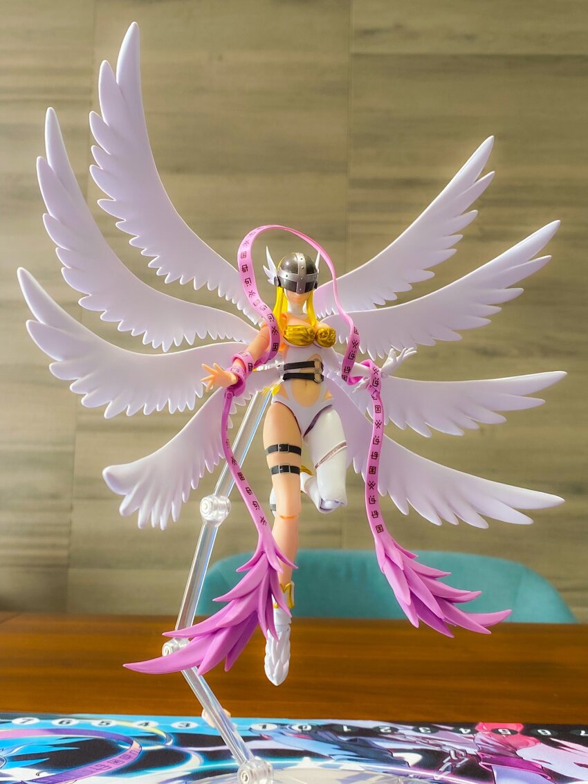 angel angel_girl angewomon digimon digimon_(creature) digimon_adventure figure figure_stand head_wings highres long_hair mask photo_(medium) playmat real_life wings