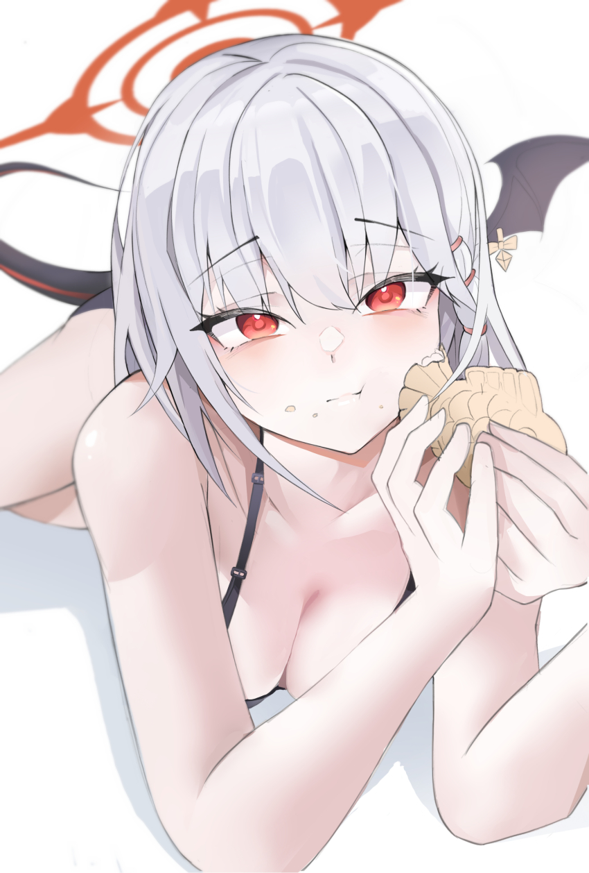 1girl :t absurdres alternate_costume bikini black_bikini blue_archive blurry blush breasts cleavage closed_mouth collarbone commentary demon_girl demon_tail demon_wings depth_of_field eating eyelashes eyes_visible_through_hair feet_out_of_frame food food_on_face hair_between_eyes halo hands_up haruna_(blue_archive) highres holding holding_food looking_at_viewer lying medium_breasts on_stomach piercing red_eyes red_halo single_wing solo swimsuit tail taiyaki tsurime umber00 wagashi wing_piercing wings