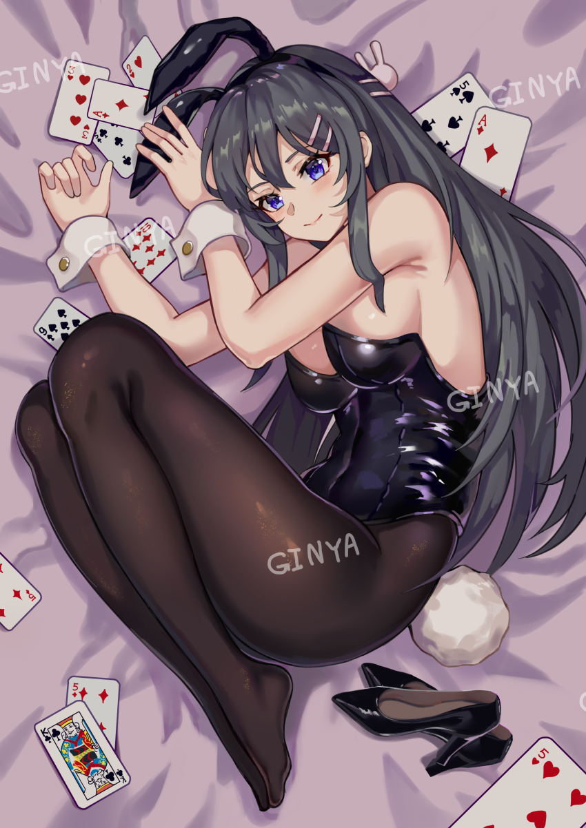 1girl absurdres ace_(playing_card) ace_of_diamonds animal_ears bare_arms bare_shoulders bed_sheet black_hair black_hairband black_leotard black_pantyhose black_shoes blue_eyes blush breasts card diamond_(shape) fake_animal_ears fake_tail ginyasama hair_between_eyes hair_ornament hairband hairclip hands_up high_heels highres king_(playing_card) king_of_clubs knees_up leotard long_hair lying medium_breasts no_shoes on_side pantyhose playboy_bunny playing_card rabbit_ears rabbit_tail sakurajima_mai seishun_buta_yarou shoes smile solo tail thighs unworn_shoes wrist_cuffs