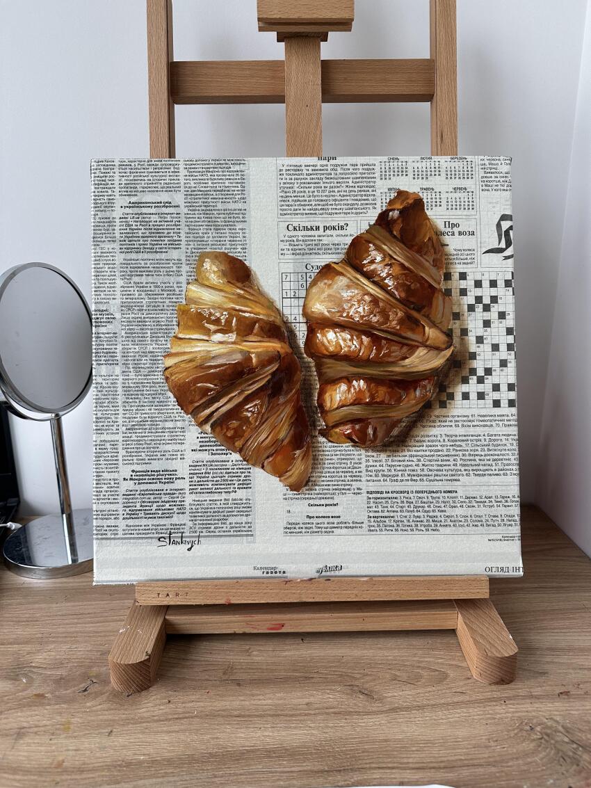 absurdres art_tools_in_frame canvas_(medium) croissant easel food food_focus highres julia_stankevych mirror no_humans oil_painting_(medium) original painting_(medium) photo_(medium) realistic signature simple_background still_life traditional_media
