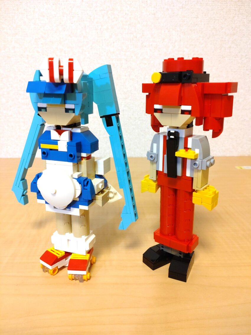 2girls alternate_costume apron arms_at_sides black_footwear black_necktie blue_dress blue_eyes blue_hair bow choroli_(chorolin) dress drill_hair full_body grey_shirt hair_bow hat hatsune_miku highres kasane_teto lego_(medium) long_hair mesmerizer_(vocaloid) multiple_girls necktie pants puffy_short_sleeves puffy_sleeves red_eyes red_footwear red_hair red_hat red_pants roller_skates shirt shoes short_dress short_sleeves skates sleeves_rolled_up socks standing striped_bow suspenders twin_drills twintails unconventional_media very_long_hair vocaloid white_apron white_socks