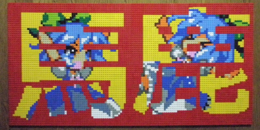 &gt;_&lt; 1girl arms_up blue_dress blue_eyes blue_hair bow cirno dress closed_eyes green_bow hair_bow highres lego lego_(medium) open_mouth photo_(medium) pixel_art short_hair short_sleeves solo touhou translation_request unconventional_media you_rei_(blowback)