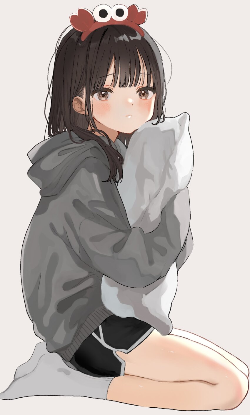 1girl absurdres black_hair black_shorts blunt_bangs blush brown_eyes closed_mouth commentary crab crab_on_head dot_nose from_side full_body grey_hoodie hair_over_shoulder hairband highres holding holding_pillow hood hoodie kneeling long_hair looking_at_viewer maple_(abc2215) original pillow shorts sidelocks simple_background socks solo white_socks