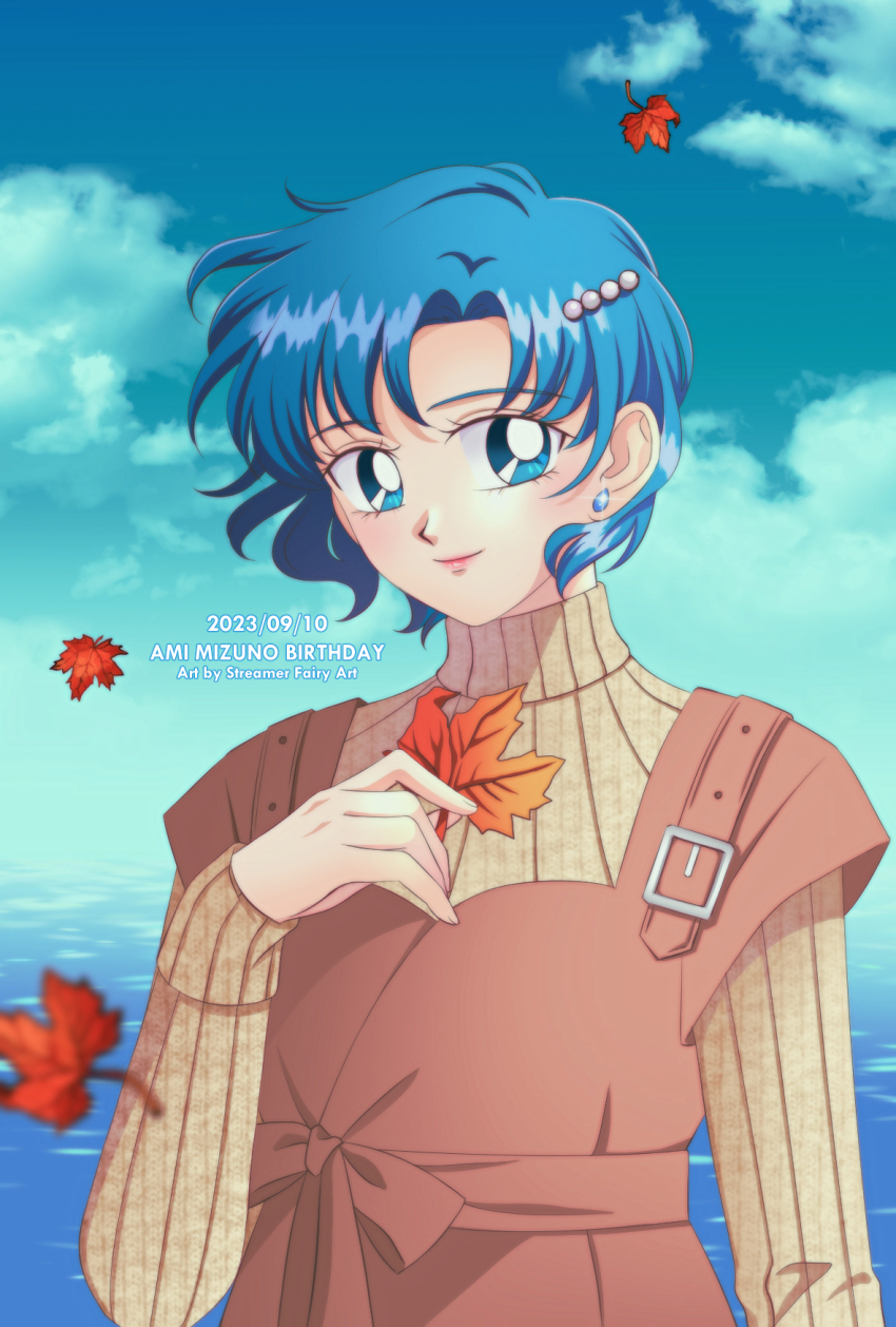 1girl artist_name autumn_leaves bishoujo_senshi_sailor_moon blue_eyes blue_hair brown_dress brown_sweater cloud cloudy_sky dated dress earrings highres holding holding_leaf jewelry koya leaf light_smile looking_at_viewer mizuno_ami outdoors sky solo sweater turtleneck turtleneck_sweater upper_body water