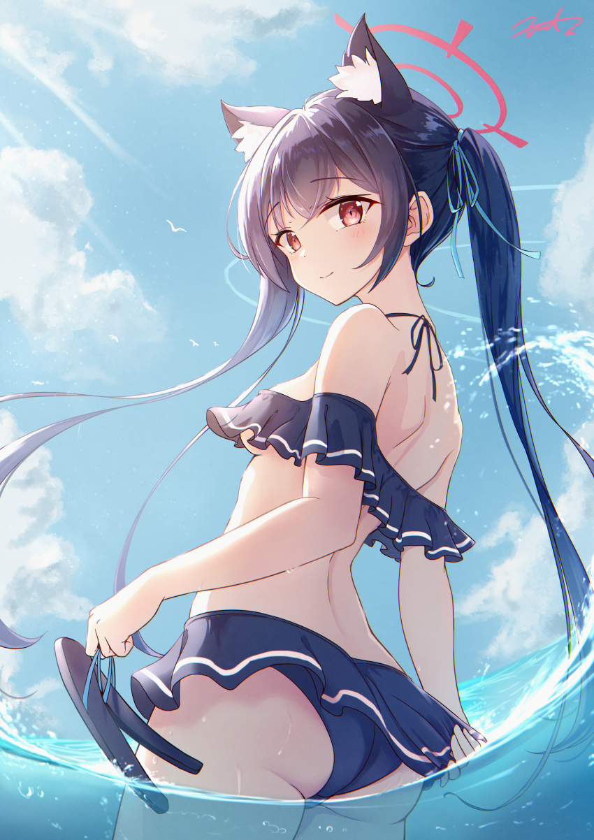 1girl absurdres animal_ears ass bare_shoulders bikini bikini_tug black_hair blue_archive blue_bikini blue_ribbon blue_sky breasts cat_ears cat_girl closed_mouth cloud commentary cowboy_shot day extra_ears frilled_bikini frills fritz614 from_behind hair_ribbon halo halterneck highres holding holding_sandals holding_unworn_clothes long_hair looking_at_viewer looking_back ocean off-shoulder_bikini off_shoulder official_alternate_costume outdoors partially_underwater_shot red_eyes red_halo ribbon sandals serika_(blue_archive) serika_(swimsuit)_(blue_archive) signature sky small_breasts smile solo standing sunlight swimsuit twintails very_long_hair wading