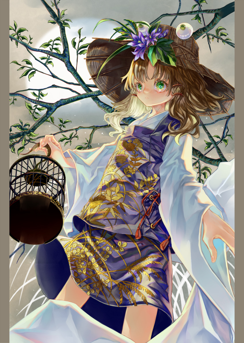 1girl absurdres birdcage blonde_hair blue_skirt blue_vest branch brown_background cage cowboy_shot embellished_costume floral_print flower gold_trim green_eyes hat hat_flower highres holding holding_cage long_sleeves looking_at_viewer medium_hair moon moriya_suwako pillarboxed plant purple_flower shirt skirt skirt_set solo standing straw_hat syukou touhou vest white_shirt