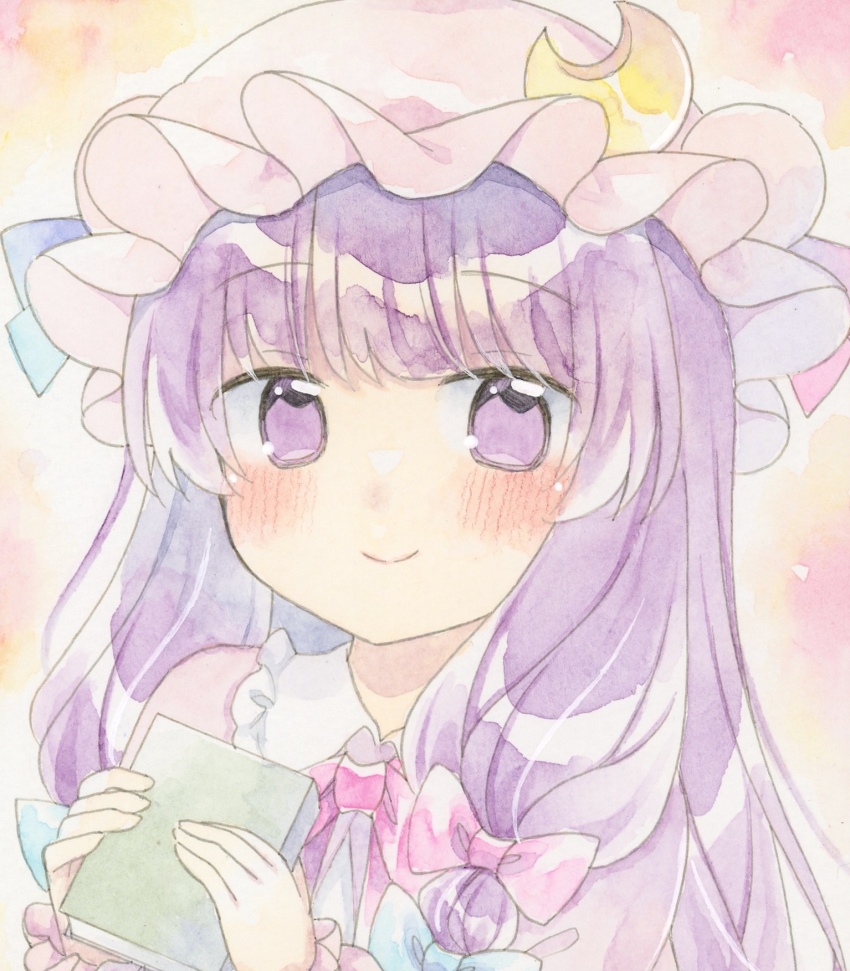 1girl blue_bow blue_ribbon blush book bow closed_mouth commentary_request crescent crescent_hat_ornament hair_bow hat hat_ornament hat_ribbon highres holding holding_book kagome_f long_hair looking_at_viewer mob_cap painting_(medium) patchouli_knowledge pink_bow purple_eyes purple_hair ribbon shikishi smile solo touhou traditional_media upper_body watercolor_(medium)