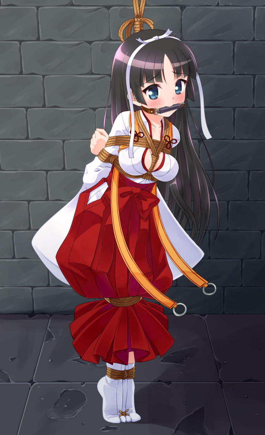 1girl arms_behind_back bdsm bit_gag black_hair blue_eyes blush bondage bound bound_ankles bound_toes breast_bondage breasts cleavage dungeon embarrassed gag hair_ribbon hakama hakama_skirt hidan_no_aria highres hotogi_shirayuki indoors japanese_clothes long_hair miko mukanata open_clothes red_hakama ribbon ribbon_trim shirt skirt standing stone_floor stone_wall suspension tabi tiptoes wall white_ribbon wide_sleeves