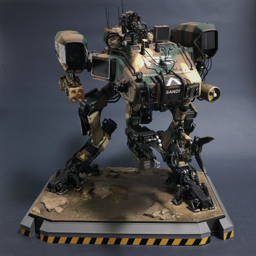 bad_id bad_twitter_id camouflage chappie gatling_gun highres kusami_toka_naku_au mecha military model_kit model_kit_(medium) moose_(chappie) no_humans photo_(medium) realistic robot rocket_launcher science_fiction solo standing turret unconventional_media weapon