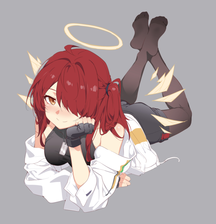 1girl ahoge arknights back_peek bare_shoulders black_pantyhose breasts crossed_ankles exusiai_(arknights) exusiai_the_new_covenant_(arknights) full_body hair_over_one_eye halo highres jacket kataokasan long_hair looking_at_viewer lying no_shoes on_stomach pantyhose red_eyes red_hair shirt shorts side_ponytail small_breasts smile solo t-shirt the_pose wings