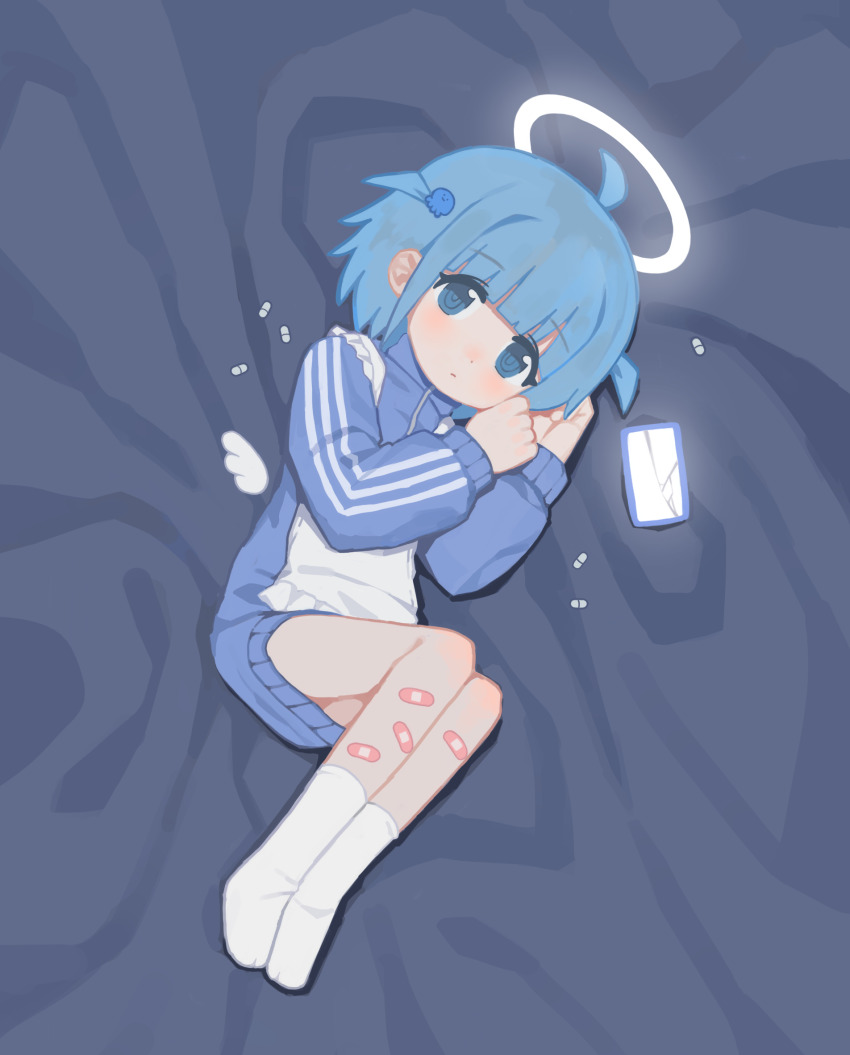 1girl ahoge apron bandaid bandaid_on_leg bed_sheet blue_eyes blue_hair blue_jacket blush cellphone closed_mouth commentary_request cracked_screen detached_wings frilled_apron frills full_body hair_ornament halo hands_up highres indie_utaite jacket jersey_maid korean_commentary lakilolom long_sleeves lying maid mini_wings no_shoes on_side phone pill puffy_long_sleeves puffy_sleeves ringed_eyes socks solo squid_hair_ornament track_jacket two_side_up unconventional_maid white_apron white_socks white_wings wings wotoha_(character)