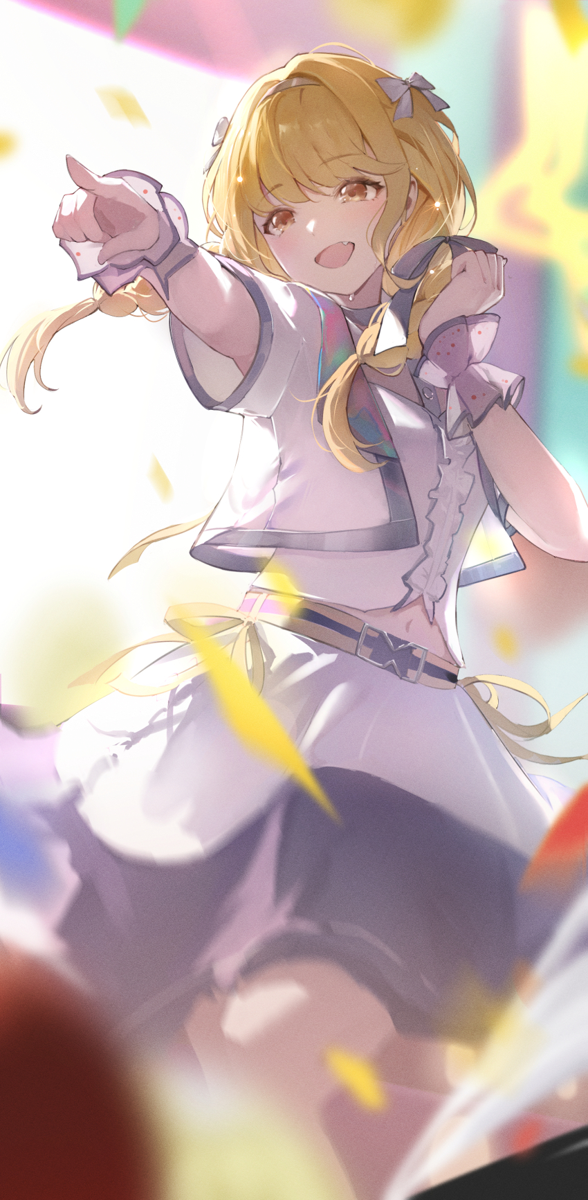 1girl absurdres blonde_hair blurry blurry_background blurry_foreground blush center_frills commentary confetti cropped_jacket cropped_shirt depth_of_field fang frilled_wristband frills fujita_kotone gakuen_idolmaster highres idol_clothes idolmaster jacket jiang_zhuti_jiojio looking_to_the_side navel pointing sekaiichi_kawaii_watashi_(idolmaster) shirt short_sleeves skin_fang smile solo white_jacket white_shirt yellow_eyes
