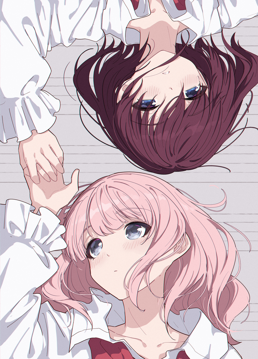 2girls blue_eyes blush brown_hair commentary english_commentary girls_band_cry grey_eyes hair_down highres hina_(girls_band_cry) holding_hands iseri_nina long_hair long_sleeves lying medium_hair multiple_girls on_back parted_lips pink_hair shirt white_shirt yun_cao_bing yuri