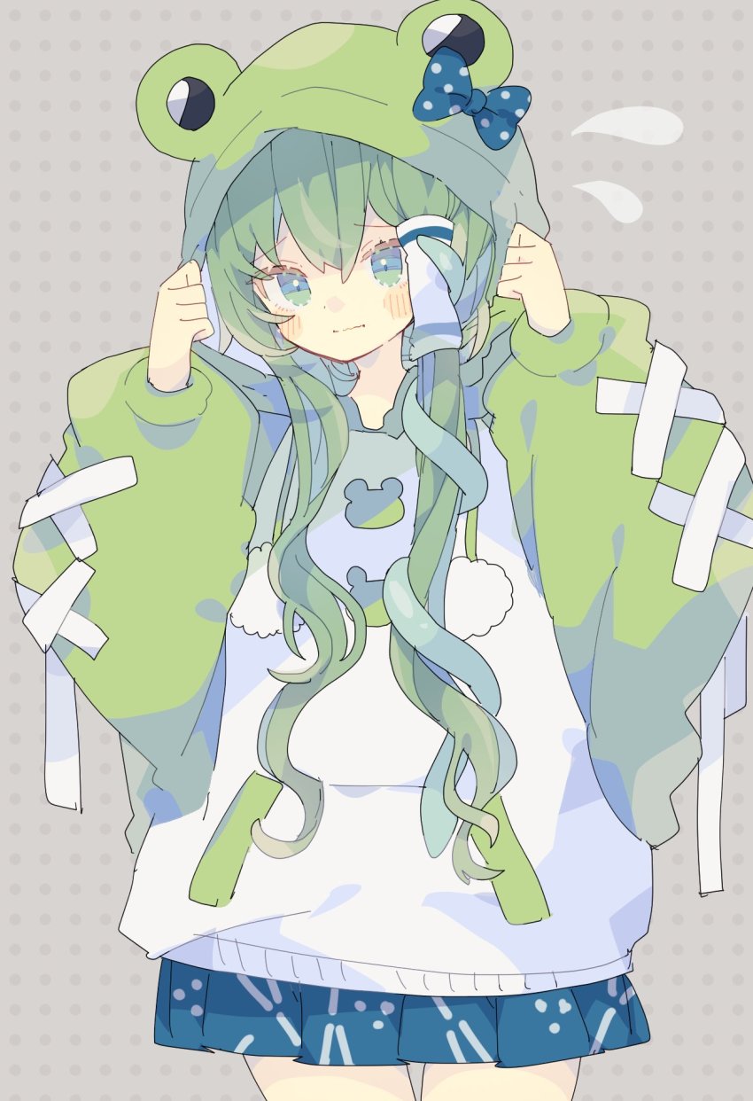 1girl adapted_costume animal_hood blue_bow blue_skirt blush bow closed_mouth commentary cowboy_shot flying_sweatdrops frog_hood furrowed_brow green_eyes green_hair green_hoodie hair_ornament hair_tubes highres holding_hoodie hood hood_up hoodie kochiya_sanae long_hair long_sleeves looking_at_viewer nikorashi-ka pleated_skirt polka_dot polka_dot_bow puffy_sleeves ribbon simple_background single_hair_tube skirt snake_hair_ornament solo touhou two-tone_hoodie white_hoodie white_ribbon x