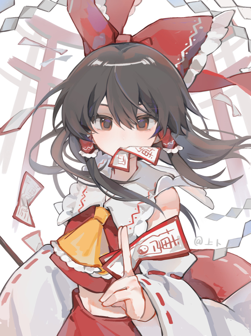 1girl ascot between_fingers bow brown_hair collared_shirt cowboy_shot crop_top detached_sleeves frilled_ascot frilled_bow frilled_shirt_collar frills hair_between_eyes hair_bow hakurei_reimu highres holding holding_ofuda long_hair mouth_hold nontraditional_miko ofuda ofuda_between_fingers red_bow red_eyes red_shirt red_skirt ribbon-trimmed_skirt ribbon-trimmed_sleeves ribbon_trim shang_bu shirt sidelocks skirt sleeveless sleeveless_shirt solo torii touhou white_sleeves yellow_ascot