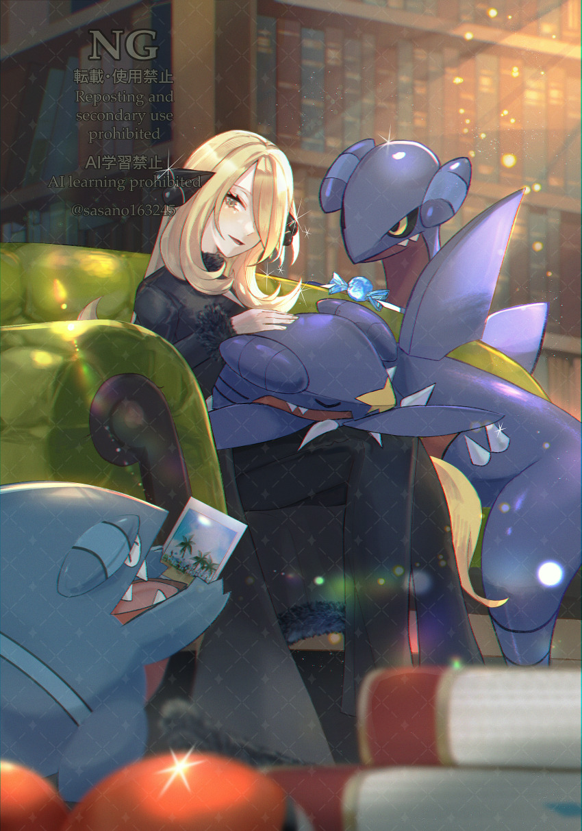 1girl absurdres black_pants blonde_hair blurry blurry_foreground book bookshelf candy_wrapper commentary_request couch cynthia_(pokemon) evolutionary_line eyelashes gabite garchomp gen_4_pokemon gible glint hair_ornament hair_over_one_eye highres indoors library long_hair long_sleeves nintendo open_mouth pants photo_(object) pokemon pokemon_(creature) pokemon_dppt sitting smile ssn_(sasa8u9r) watermark