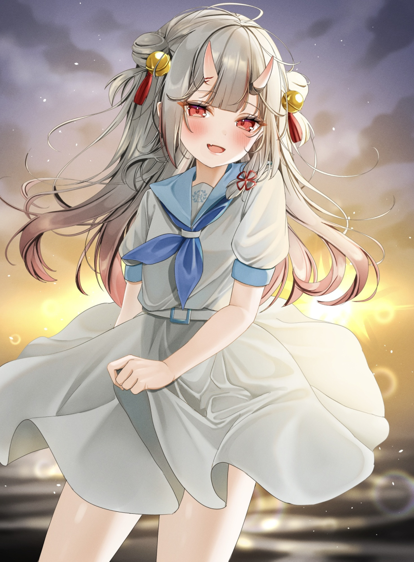 1girl ahoge bell blue_neckerchief commentary_request dress fang floating_hair gradient_hair hair_bell hair_bun hair_ornament highres hololive horns long_hair looking_at_viewer multicolored_hair nakiri_ayame neckerchief ohagetty red_eyes sailor_collar skin-covered_horns skin_fang skirt_hold smile sunset virtual_youtuber white_dress white_hair