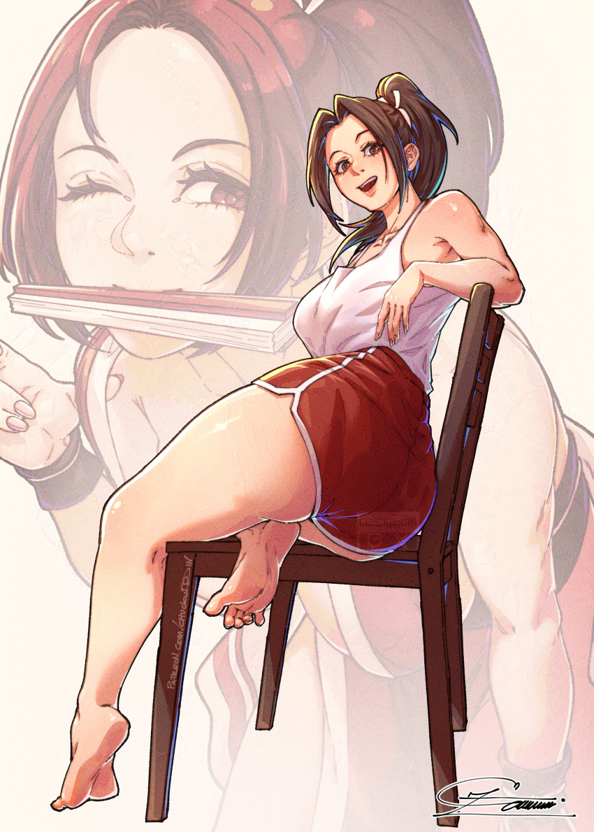 1girl absurdres ass bare_legs barefoot breasts brown_hair chuckuddin cleavage dolphin_shorts fatal_fury folded_fan folding_fan hand_fan high_ponytail highres leaning_forward motoyui mouth_hold official_alternate_costume ponytail red_shorts shiranui_mai short_shorts shorts smile solo street_fighter street_fighter_6 tank_top white_tank_top