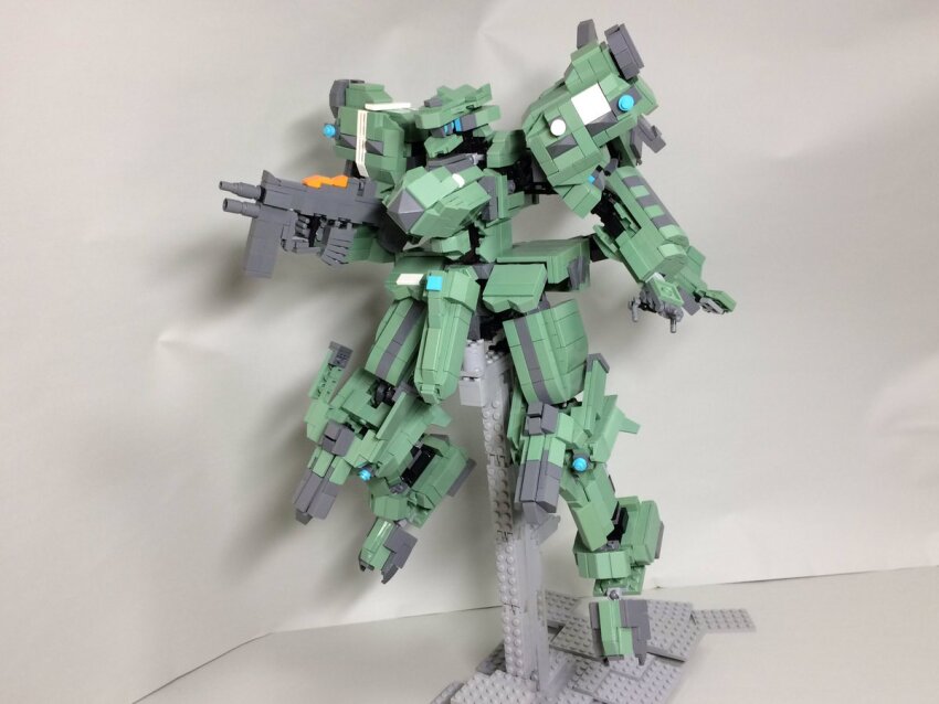 f-22a_raptor_(muv-luv) full_body gun holding holding_gun holding_weapon lego_(medium) looking_ahead mecha mecha_focus muv-luv muv-luv_alternative nanoka_boozu open_hand photo_(medium) robot science_fiction shadow solo tactical_surface_fighter unconventional_media weapon