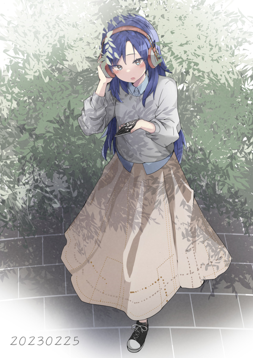 1girl birthday black_shoes blue_hair broken_phone brown_skirt bush cellphone commentary dated from_above full_body grey_shirt hand_up headphones highres holding holding_phone idolmaster idolmaster_(classic) kisaragi_chihaya laki long_hair long_skirt long_sleeves open_mouth outdoors phone shirt shoes skirt smartphone solo