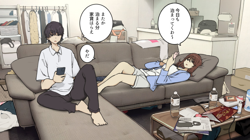 1boy 1girl bag barefoot black_hair black_pants blue_shirt bottle brown_hair cellphone commentary_request couch grey_shorts highres indoors lying magazine_(object) on_back on_couch original pants phone shirt short_hair shorts sitting speech_bubble table toes translated unworn_clothes wakamatsu372 white_shirt