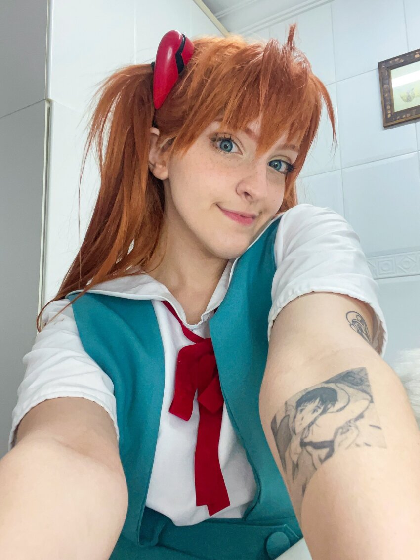 1girl :&gt; arm_tattoo blue_eyes brazilian_(nationality) brown_hair cosplay hairpods highres interface_headset_(evangelion) lips looking_at_viewer memepantazis neon_genesis_evangelion photo_(medium) real_life school_uniform selfie skirt smile souryuu_asuka_langley souryuu_asuka_langley_(cosplay) standing suspender_skirt suspenders tattoo tokyo-3_middle_school_uniform twintails two_side_up