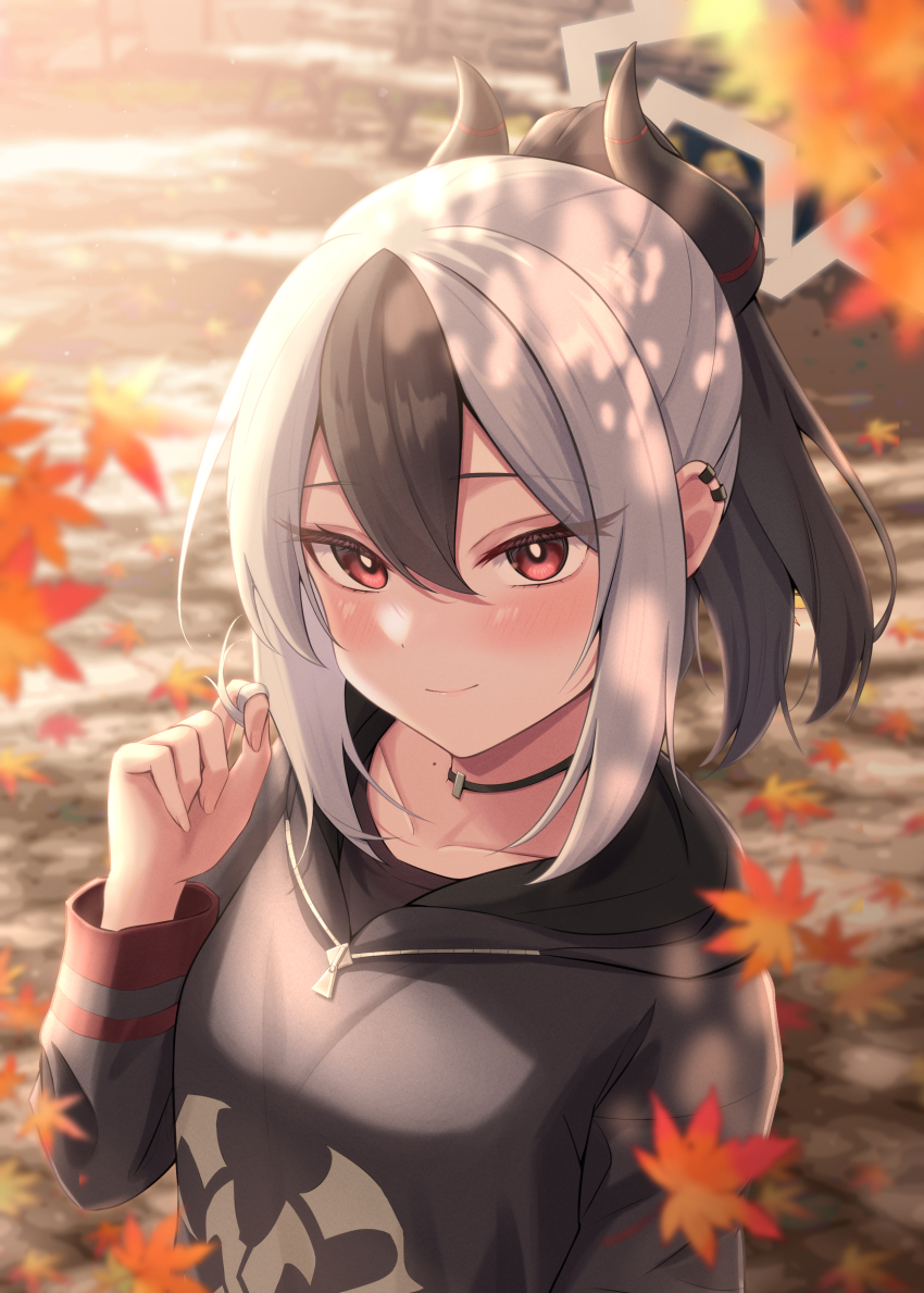 1girl absurdres autumn autumn_leaves black_choker black_hair black_hoodie blue_archive blurry blush bright_pupils choker closed_mouth collarbone commentary_request dappled_sunlight day demon_girl demon_horns depth_of_field double-parted_bangs earclip eyelashes eyes_visible_through_hair falling_leaves grey_halo hair_between_eyes halo hand_up highres hood hood_down hoodie horns kayoko_(blue_archive) leaf long_hair looking_at_viewer maple_leaf miyuki_kotori mole mole_on_neck multicolored_hair outdoors playing_with_own_hair ponytail red_eyes sidelocks smile solo sunlight tsurime two-tone_hair upper_body white_hair white_pupils