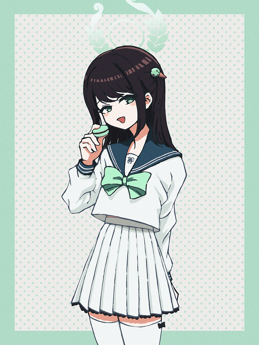 1girl :d airi_(blue_archive) arm_behind_back blue_archive blue_sailor_collar border bow bowtie brown_hair cowboy_shot food green_border green_bow green_bowtie green_eyes halo head_tilt high-waist_skirt highres holding holding_food legs_together long_hair long_sleeves looking_at_viewer macaron nkymyura open_mouth pleated_skirt polka_dot polka_dot_background sailor_collar school_uniform serafuku shirt shirt_overhang sidelocks skirt sleeve_cuffs smile solo swept_bangs thighhighs thighs white_background white_serafuku white_shirt white_skirt white_thighhighs zettai_ryouiki