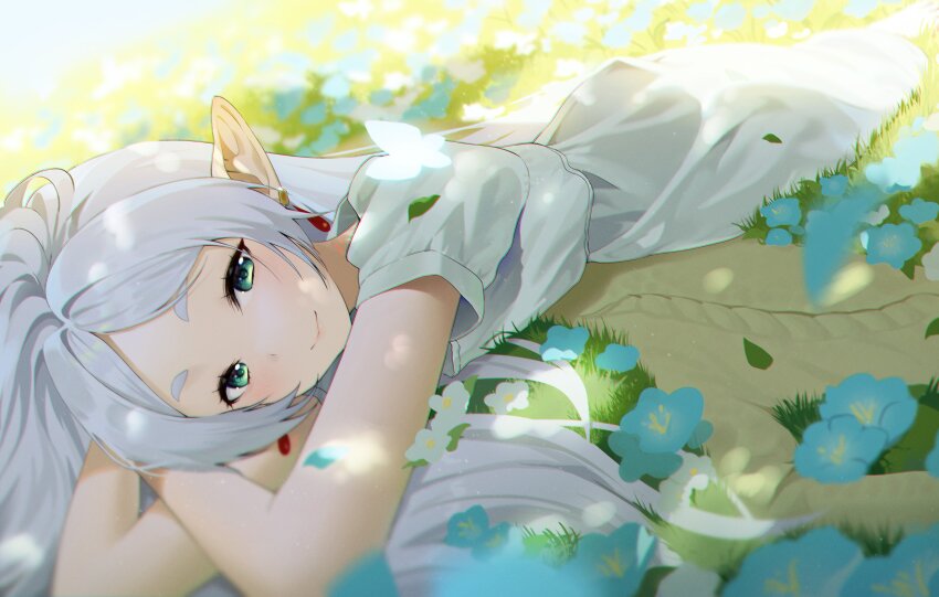 1girl absurdres ayoni_623 blue_flower blurry blush bug butterfly closed_mouth commentary crossed_arms day depth_of_field dress dutch_angle earrings elf eyelashes flower forehead frieren glowing_butterfly grass green_eyes grey_hair hair_down happy hashtag-only_commentary highres insect jewelry long_hair looking_at_viewer lying on_grass on_stomach outdoors parted_bangs pointy_ears short_sleeves smile solo sousou_no_frieren thick_eyebrows tsurime white_dress white_flower