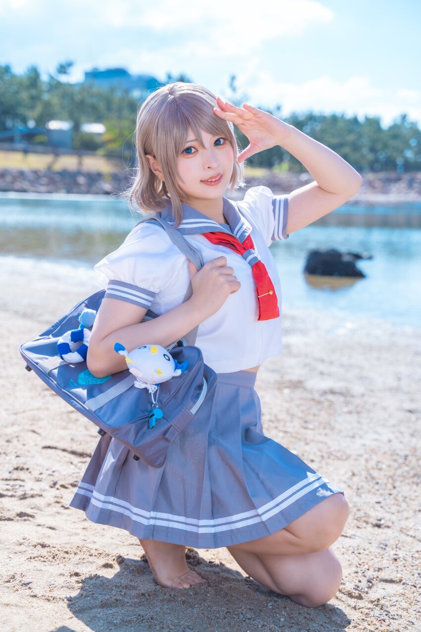 1girl absurdres beach blue_eyes brown_hair cosplay cosplay_photo grey_hair highres love_live! love_live!_sunshine!! outdoors photo_(medium) real_life sailor_collar sand solo uranohoshi_school_uniform watanabe_you