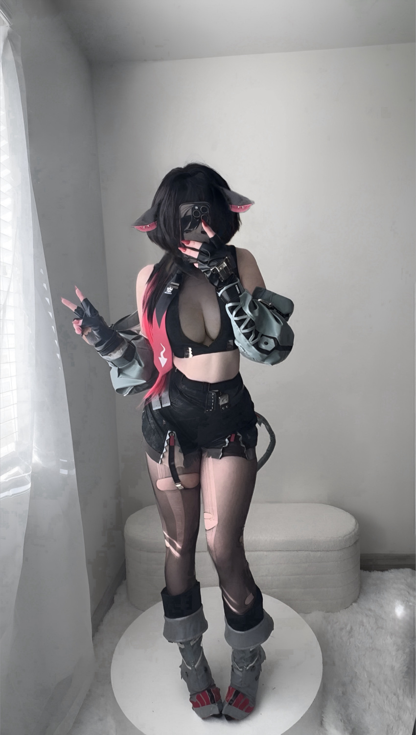 1girl 2024 absurdres animal_ears arms_up black_gloves black_hair black_shirt black_shorts boots breasts cleavage commentary cosplay cosplay_photo crop_top cropped_jacket english_commentary female_focus gloves gradient_hair grey_boots grey_jacket highres holding indoors jacket jacket_on_shoulders jane_doe_(zenless_zone_zero) jane_doe_(zenless_zone_zero)_(cosplay) kltt3y large_breasts long_hair low-tied_long_hair low_ponytail midriff mouse_ears mouse_girl multicolored_hair pantyhose photo_(medium) ponytail real_life red_hair red_nails red_trim selfie shirt shorts solo standing tail thick_thighs thighs torn_clothes torn_pantyhose v zenless_zone_zero