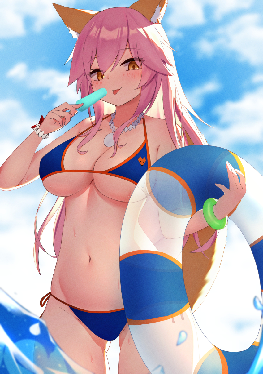 1girl absurdres animal_ear_fluff animal_ears bare_shoulders bikini blue_bikini blue_sky blush bracelet breasts cleavage collarbone fate/grand_order fate_(series) food fox_ears fox_girl fox_tail hair_between_eyes halterneck highres innertube jewelry large_breasts long_hair looking_at_viewer navel necklace pink_hair popsicle ru_yan side-tie_bikini_bottom sidelocks sky smile solo string_bikini swim_ring swimsuit tail tamamo_(fate) tamamo_no_mae_(fate/extra) tamamo_no_mae_(swimsuit_lancer)_(fate) thighs yellow_eyes