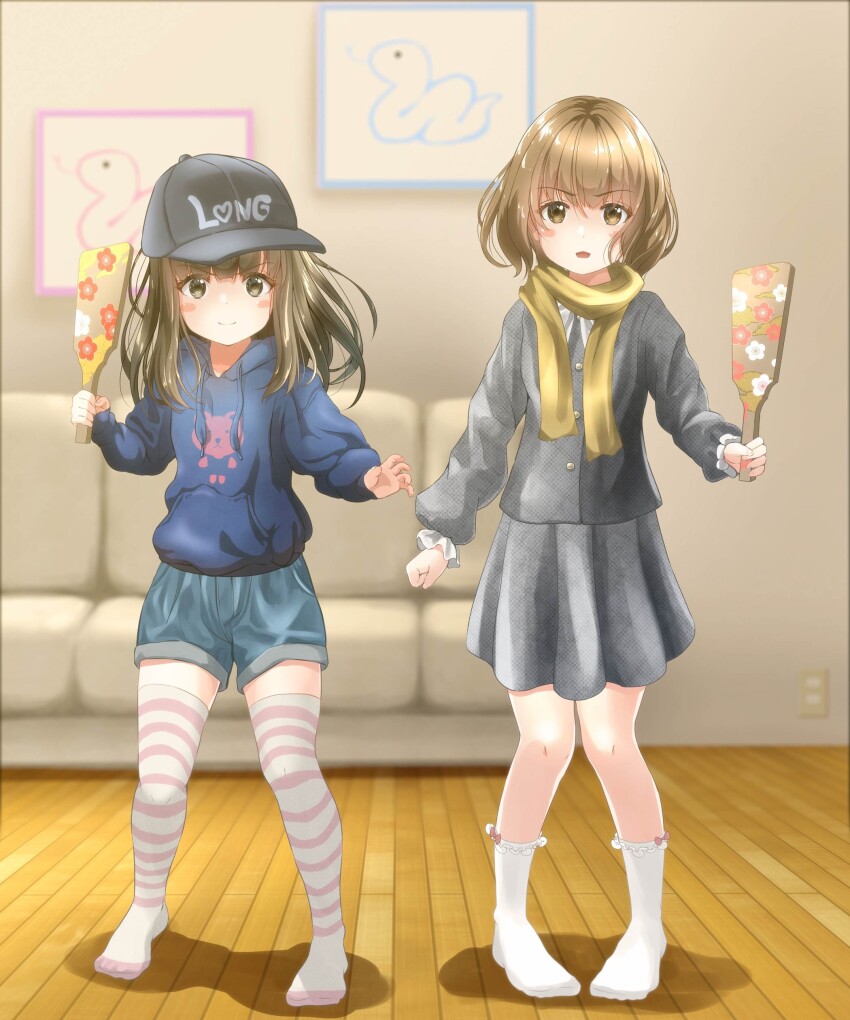 2girls absurdres baseball_cap black_hat black_shirt blue_shirt blue_shorts bob-cut_neighbor_girl_(tachiinu) brown_eyes brown_hair commentary_request couch grey_skirt hagoita hat highres indoors long-haired_neighbor_girl_(tachiinu) long_hair looking_at_viewer multiple_girls new_year no_shoes original paddle scarf shirt short_hair shorts skirt smile socks striped_clothes striped_thighhighs tachiinu thighhighs white_socks wooden_floor yellow_scarf