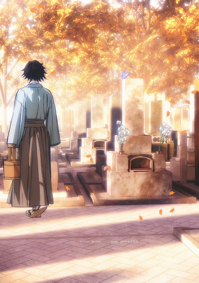 1boy autumn_leaves black_hair blue_kimono bug butterfly flower from_behind full_body ghost graveyard grey_hakama hakama highres holding insect japanese_clothes kimetsu_no_yaiba kimono leaf male_focus niku_(ni23ku) outdoors sandals short_hair solo spiked_hair tomioka_giyuu white_flower