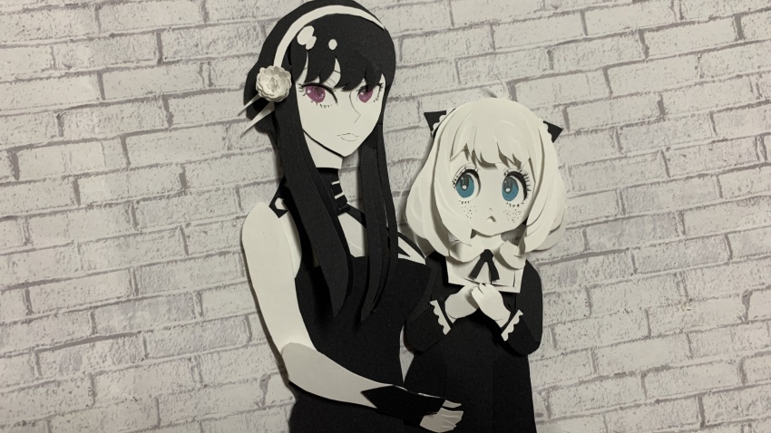 2girls :&lt; absurdres ahoge anya_(spy_x_family) black_dress black_gauntlets black_hair breasts brick_wall child collared_shirt commentary cropped_legs dress english_commentary expressionless flower freckles from_side green_eyes hair_bun hair_flower hair_ornament hairband highres holding holding_needle long_hair looking_at_viewer medium_breasts medium_hair multiple_girls needle open_mouth outside_border own_hands_together paper_cutout_(medium) papercraft_(medium) partially_colored pink_hair purple_eyes shirt spy_x_family unconventional_media yor_briar zhanswork