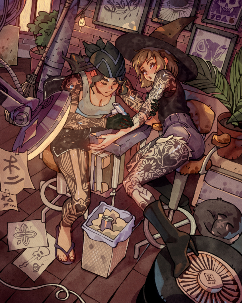 2girls arm_tattoo artist_logo bare_shoulders bike_shorts black_boots black_gloves black_hat black_shorts black_tank_top blush boots border breasts brick_wall broom brown_hair can cleavage closed_eyes closed_mouth commentary cutoff_jeans cutoffs dated drawing_(action) drawing_(object) drink_can fern flower_tattoo gloves green_headscarf grey_cat grey_sandals grey_shorts grey_tank_top half-closed_eyes hat headscarf heart heart_tattoo high_heel_boots high_heels highres holding_another&#039;s_arm indoors lamp leaning_to_the_side leg_tattoo logo long_hair looking_at_another looking_at_viewer medium_breasts medium_hair multiple_girls on_chair original picture_frame plant potted_plant sandals shorts simz sitting skull_tattoo soda_can string_of_light_bulbs tank_top tattoo tattoo_machine tattoo_sleeve toes trash_can unused_tire witch_hat wooden_floor