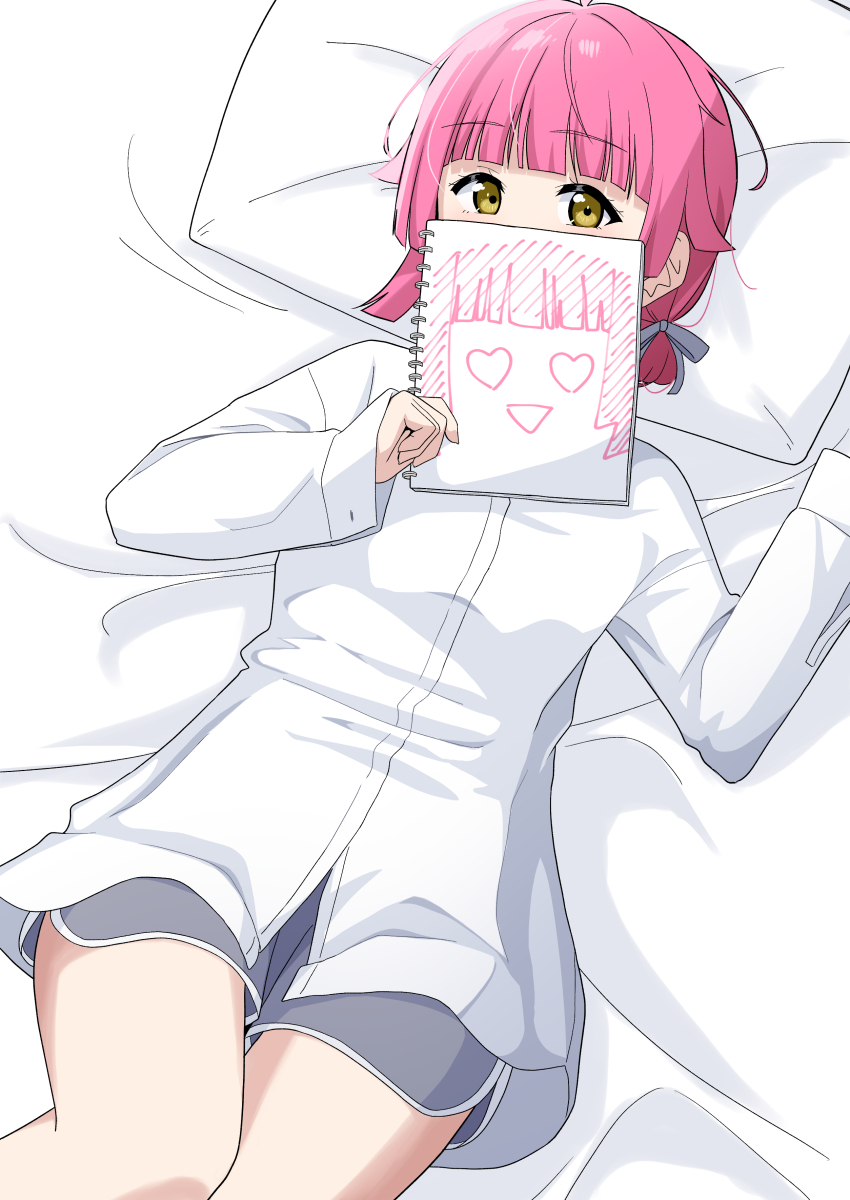 1girl :d absurdres ahoge blunt_bangs blunt_ends commentary_request covering_own_mouth drawing_(object) dress_shirt feet_out_of_frame from_above grey_shorts heart heart-shaped_eyes highres holding holding_drawing holding_sketchbook long_sleeves looking_at_viewer love_live! love_live!_nijigasaki_high_school_idol_club low_twintails lying medium_hair official_alternate_costume ohrinas on_back on_bed open_mouth oversized_clothes oversized_shirt rina-chan_board shirt short_shorts short_twintails shorts sketchbook smile solo tennoji_rina tokimeki_no_mirai_chizu triangle_mouth twintails unfinished white_shirt yellow_eyes
