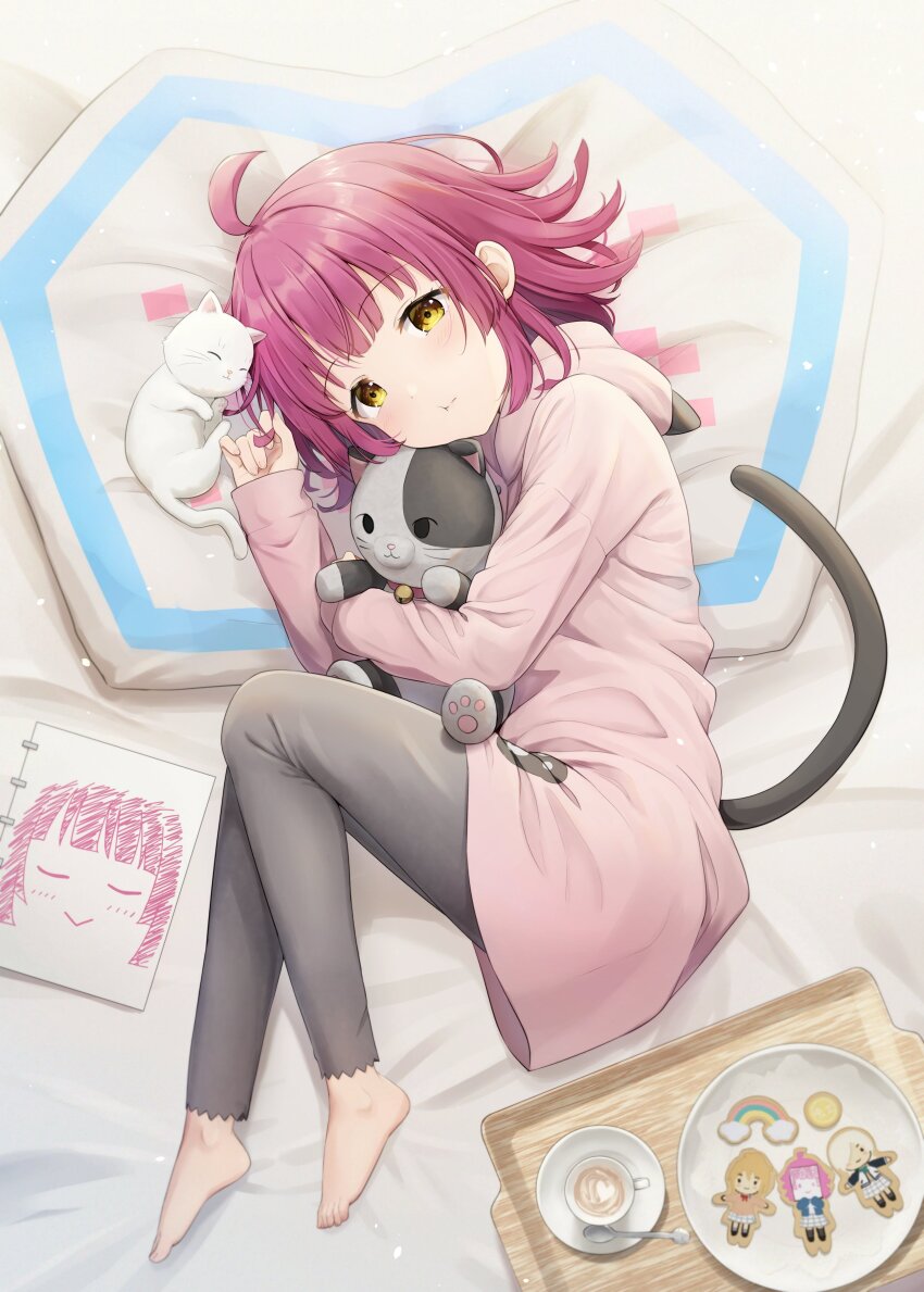 1girl absurdres ahoge animal_hood barefoot black_pants blunt_bangs blunt_ends cat cat_hood cat_tail commentary_request cookie cup disposable_cup dot_nose drawing fake_tail food hanazora_satsuki hanpen_(love_live!) highres holding holding_stuffed_toy hood hoodie latte_art light_blush long_sleeves looking_at_viewer love_live! love_live!_nijigasaki_high_school_idol_club lying medium_hair on_bed pants pink_hair pink_hoodie puffy_cheeks rina-chan_board saucer sidelocks spoon stuffed_animal stuffed_cat stuffed_toy tail teacup tennoji_rina toes tray white_cat yellow_eyes