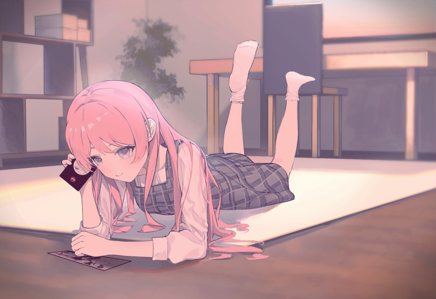 1girl absurdres anli_(jwcpp4sum0mgk5r) bang_dream! bang_dream!_it&#039;s_mygo!!!!! chair chihaya_anon closed_mouth commentary dress grey_dress grey_eyes highres indoors long_hair looking_at_viewer lying misumi_uika nagasaki_soyo no_shoes on_stomach pinafore_dress pink_hair plaid_clothes plaid_dress shirt sleeveless sleeveless_dress socks solo sumimi_(bang_dream!) sumita_mana table three-quarter_sleeves white_shirt white_socks