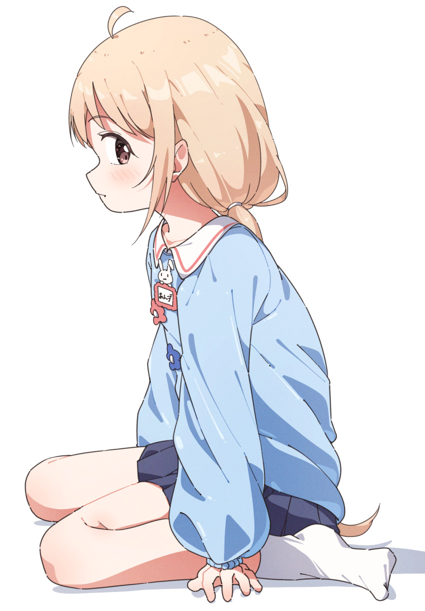 1girl ahoge bare_legs blonde_hair blue_shirt blue_skirt bluhs futaba_anzu highres idolmaster idolmaster_cinderella_girls looking_at_viewer name_tag pleated_skirt shirt sideways_glance simple_background sitting skirt smock socks solo wariza white_background white_socks yairo_ju