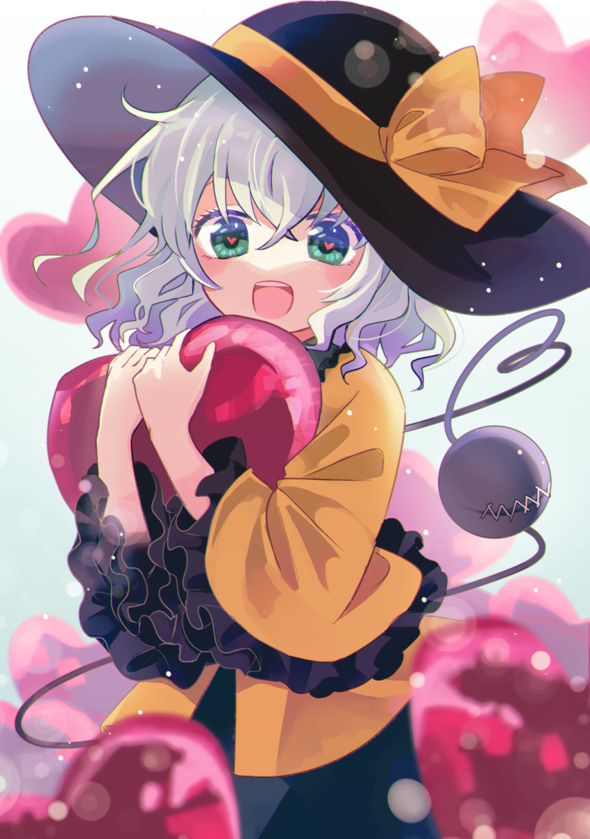 1girl black_hat blue_background frilled_sleeves frills green_eyes hat hat_ribbon heart heart-shaped_pupils heart_of_string highres hugging_object katsuragi_atori komeiji_koishi long_sleeves looking_at_viewer medium_hair open_mouth red_pupils ribbon shirt solo stitched_eye stitches symbol-shaped_pupils teeth third_eye touhou upper_body upper_teeth_only wide_sleeves yellow_ribbon yellow_shirt