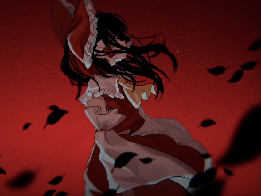 1girl ascot black_hair blurry bow commentary_request depth_of_field detached_sleeves falling_leaves frilled_bow frilled_hair_tubes frills hair_bow hair_tubes hakurei_reimu leaf long_hair multi-source_commentary red_background red_bow red_skirt ribbon-trimmed_sleeves ribbon_trim skirt skirt_set solo touhou yellow_ascot yomogi_9392