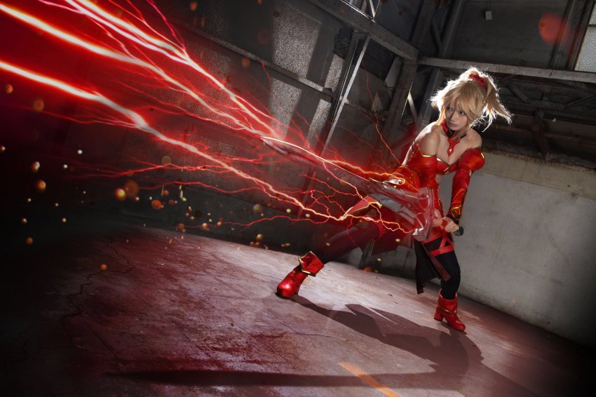 1girl bare_shoulders black_thighhighs blonde_hair boots breasts cleavage closed_mouth collarbone commentary_request cosplay cosplay_photo detached_collar detached_sleeves electricity fate/grand_order fate_(series) female_focus fighting_stance full_body green_eyes hair_ornament hair_scrunchie high_heel_boots high_heels highres holding holding_sword holding_weapon indoors knee_boots long_hair long_sleeves mordred_(fate) mordred_(fate)_(cosplay) mordred_(fate/apocrypha) photo_(medium) ponytail red_boots red_skirt scrunchie sidelocks skirt small_breasts smile solo standing sword thighhighs weapon