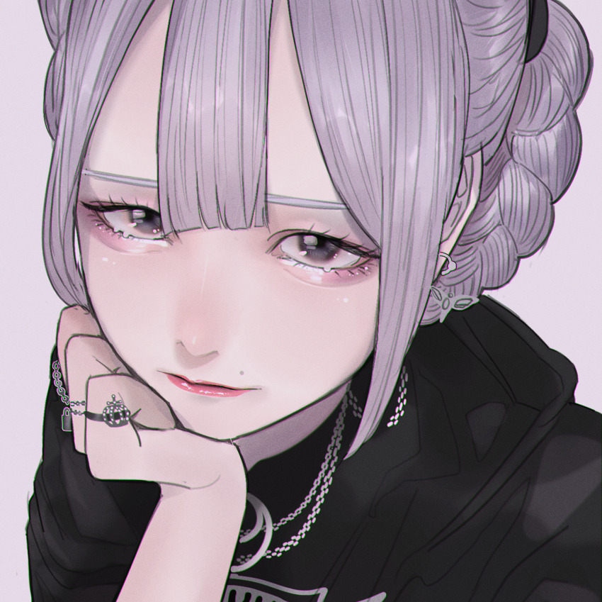 1girl aegyo_sal black_eyes black_jacket braid center-flap_bangs close-up crown_braid double-parted_bangs earrings eyelashes grey_background grey_hair hand_on_own_chin head_rest highres hood hood_down jacket jewelry lipstick looking_at_viewer makeup mano_aaa mole mole_above_mouth multiple_rings necklace original pink_lips portrait ring solo