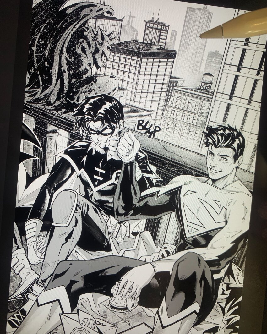 2boys black_hair building burger cape cityscape commentary damian_wayne dc_comics domino_mask english_commentary english_text fist_bump food french_fries friends gargoyle gloves greyscale happy_valentine highres jonathan_kent looking_at_another mask monochrome multiple_boys outdoors robin_(dc) scenery sound_effects superboy superhero_costume travismercer15