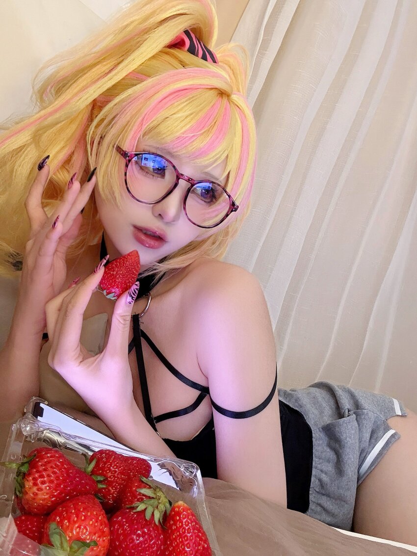 1girl absurdres adjusting_eyewear armpit_crease black_camisole black_nails blonde_hair blue_eyes camisole choker cosplay_photo food fruit grey_shorts gyaru hair_ornament hair_scrunchie highres kikuro_815 kotoka_torahime kotoka_torahime_(3rd_costume) looking_to_the_side lying multicolored_nails nail_polish nijisanji nijisanji_en o-ring o-ring_choker o-ring_top official_alternate_costume official_alternate_hairstyle on_side photo_(medium) pink_lips pink_nails pink_streaks round_eyewear scrunchie shorts single_off_shoulder spaghetti_strap strap strawberry